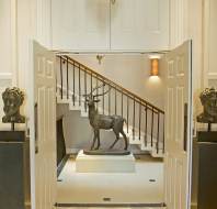 Stag sculpture and grand staircase