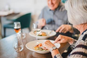 Man and woman dining in restaurant