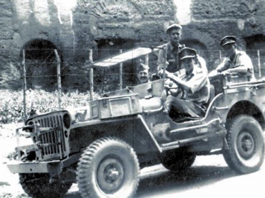 British officers in a jeep